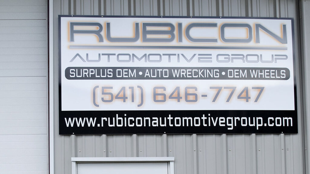 Outside building sign for Rubicon Automotive Group LLC.